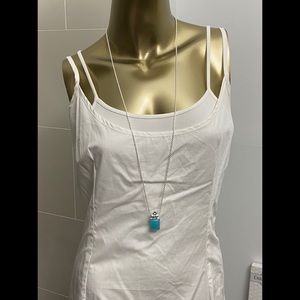 “Paraiba” chalcedony and blue topaz silver pendant